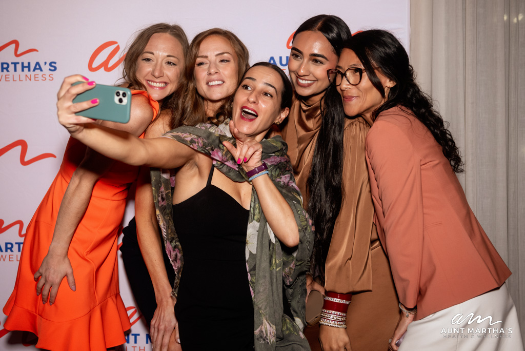 Guests posing together at Aunt Martha's 2024 Gala, The Dalcy, Chicago.