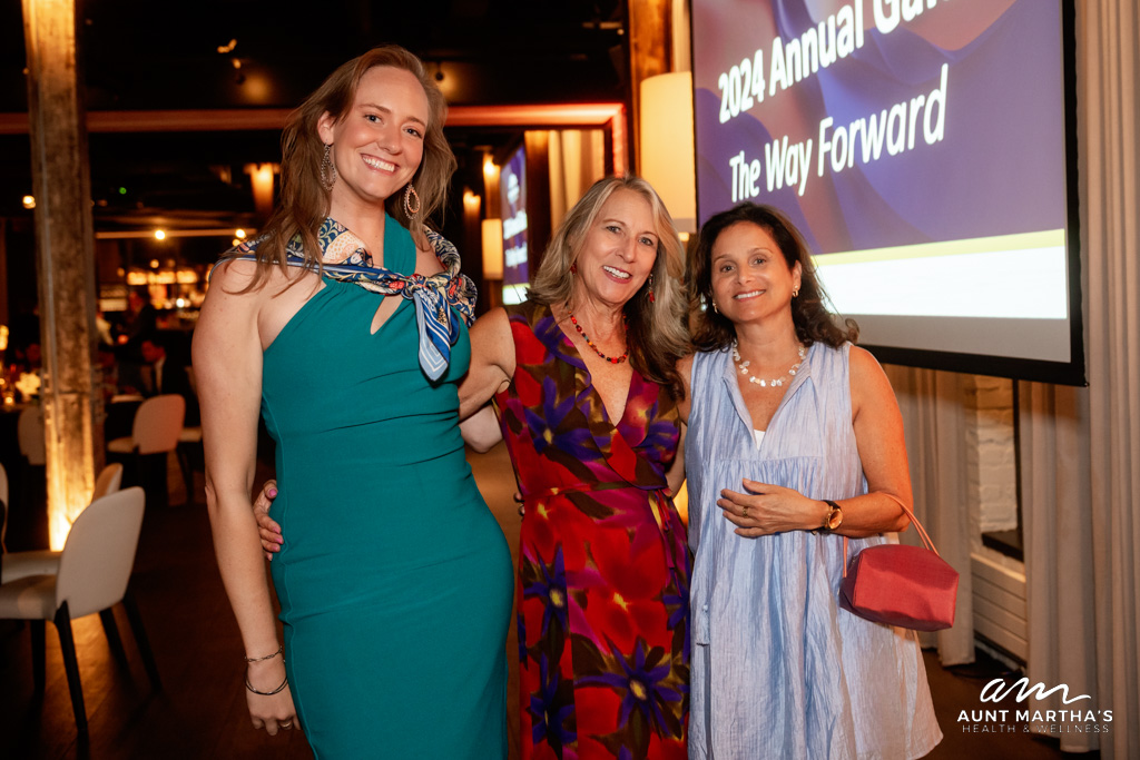 Guests posing together at Aunt Martha's 2024 Gala, The Dalcy, Chicago.